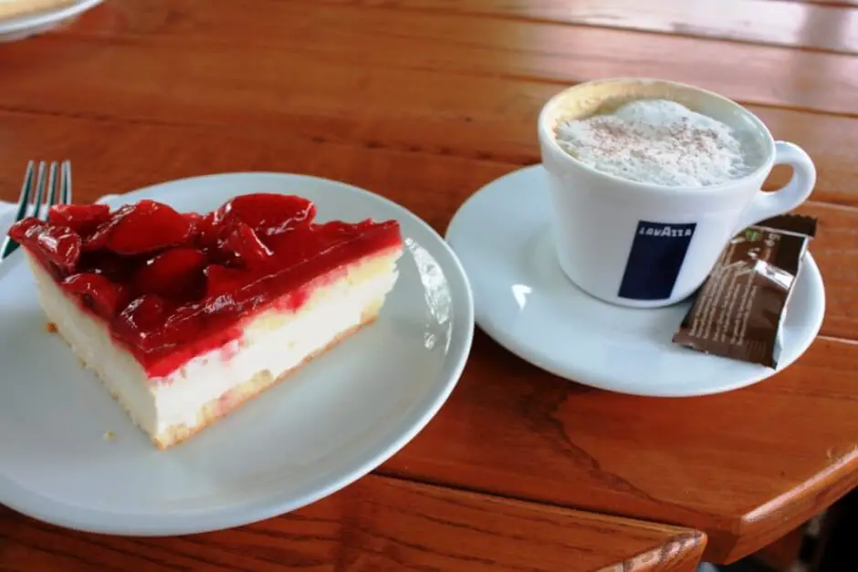 Cappuccino and strawberry cake on the Deutsches Eck