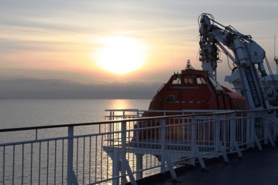 Sunset between Copenhagen and Oslo - ship and cruises