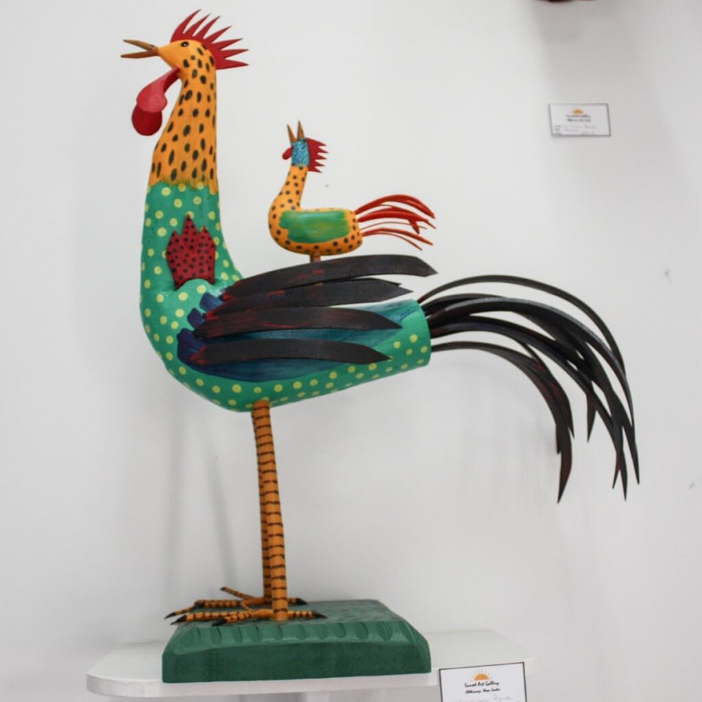 Colorful roosters of William Roach