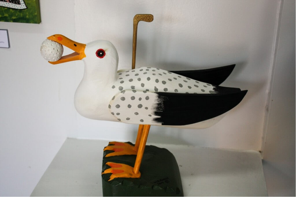 The seagull with golf ball by William Roach