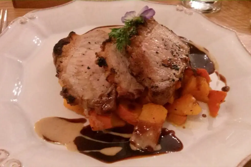 Juicy pork fillet on pumpkin vegetable