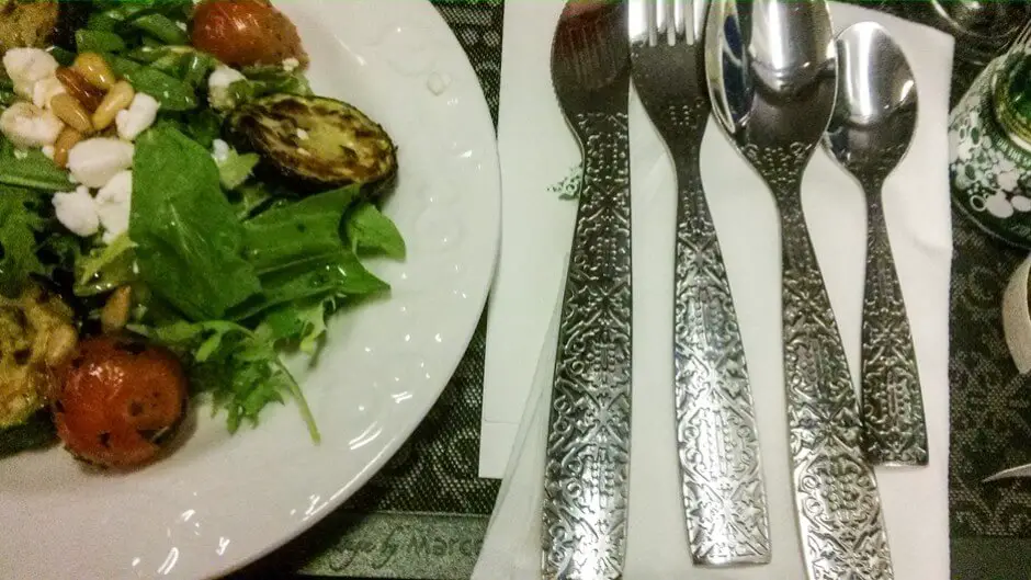 Eating with silver cutlery on porcelain plates in the KLM Business Class