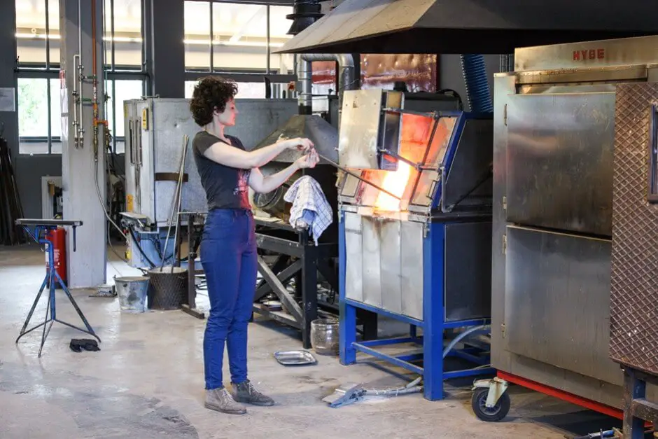 Glassblower from Australia visiting the Glass Factory on a car tour South Sweden Route