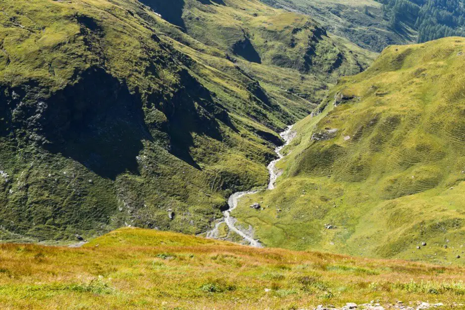 Mountain stream in the valley below us