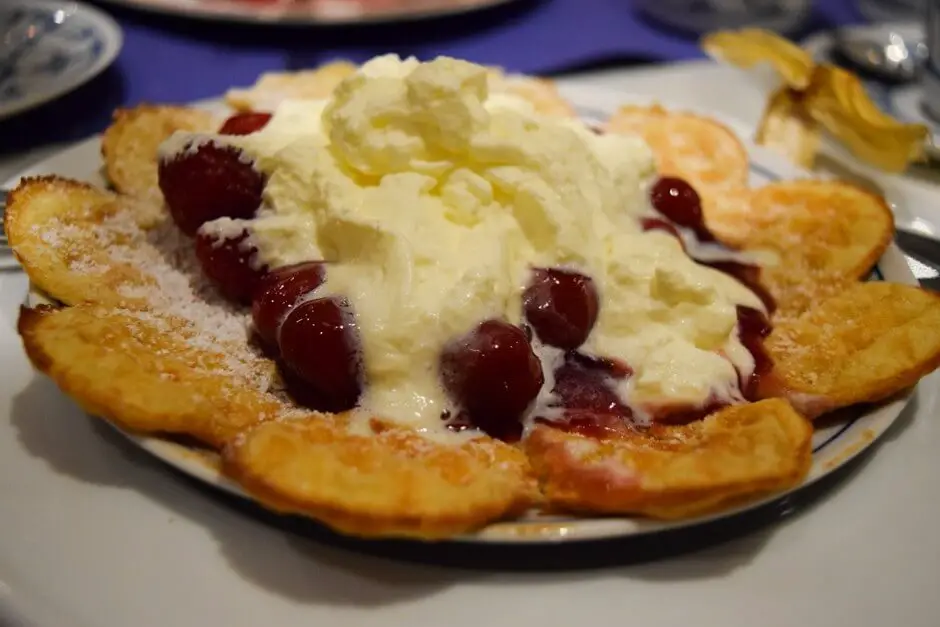 Bergische waffle with cherries and cream