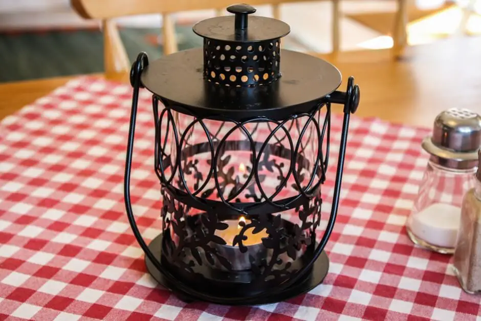 Glass lantern as a table decoration