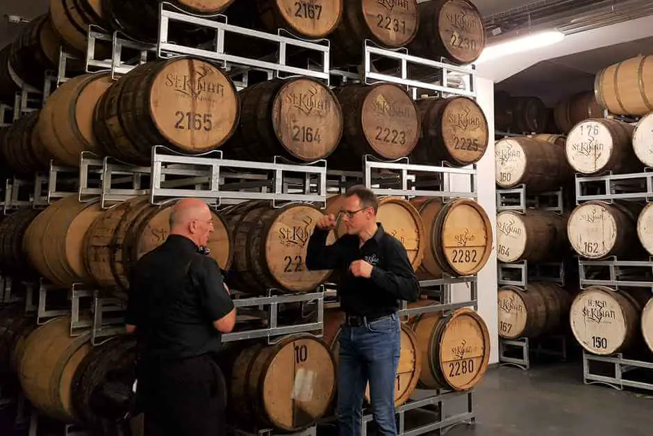 Petar talks to our guide at the whiskey distillery St. Kilian