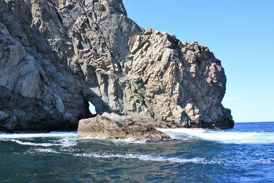 Hole in the rock cliffs in front of Twillingate Newfoundland