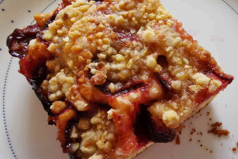 Plum cake with almond and marzipan crumble