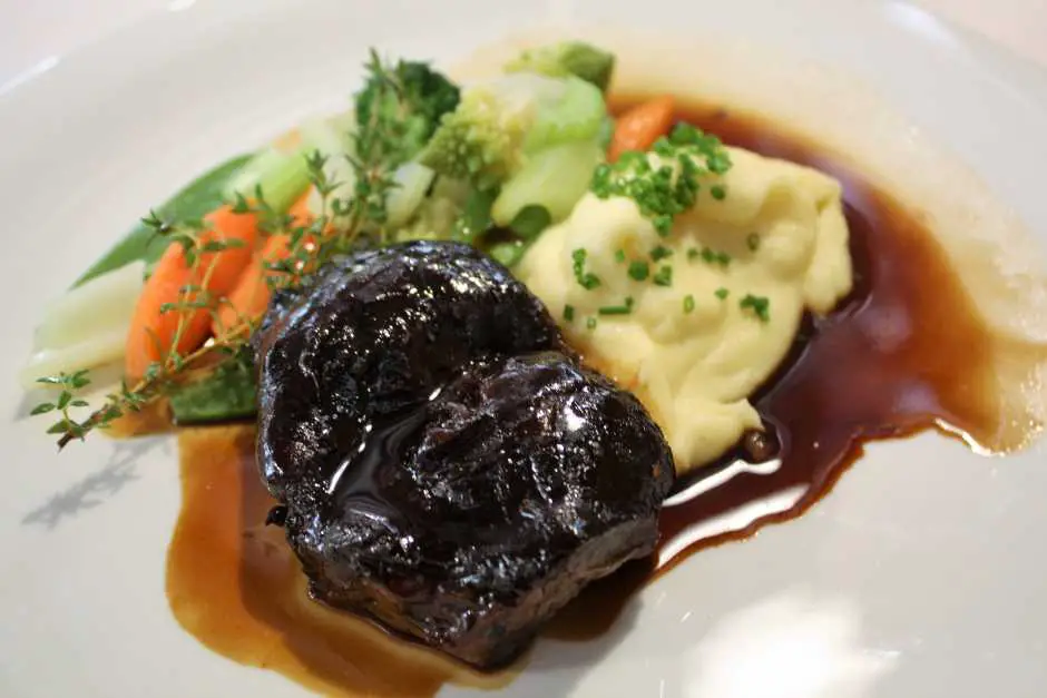 Veal cheek with parsnip puree and vegetables