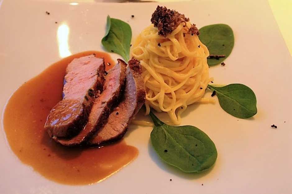 Tender veal on pasta with basil and truffles - heavenly!