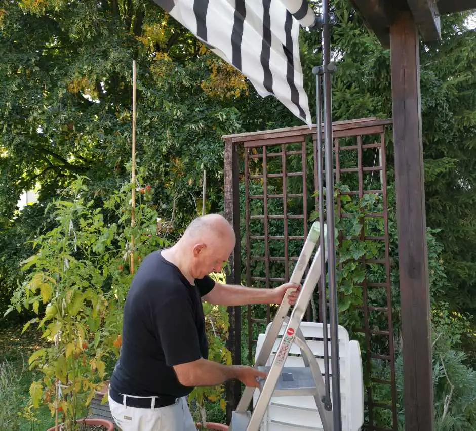 Petar assembling the awning