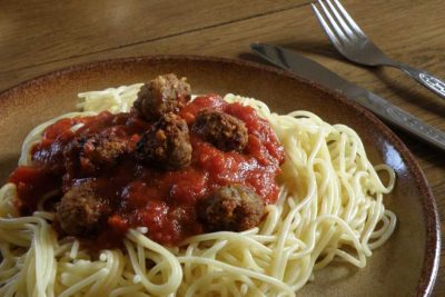 Spaghetti with meatballs in a Dutch oven