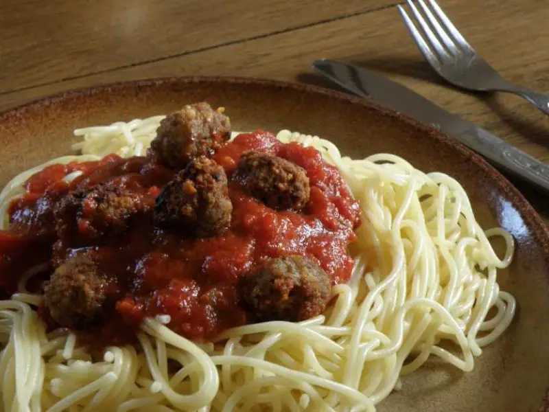 Spaghetti with meatballs in a Dutch oven