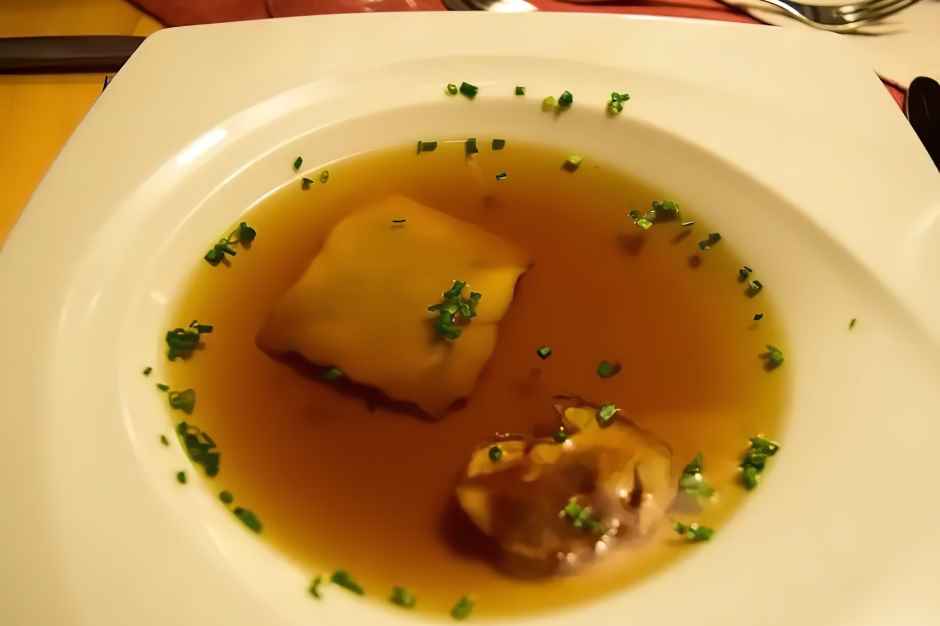 Stone mushroom procession with chestnut ravioli