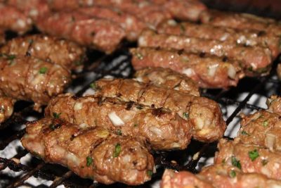 Grilling cevapcici on the gas grill