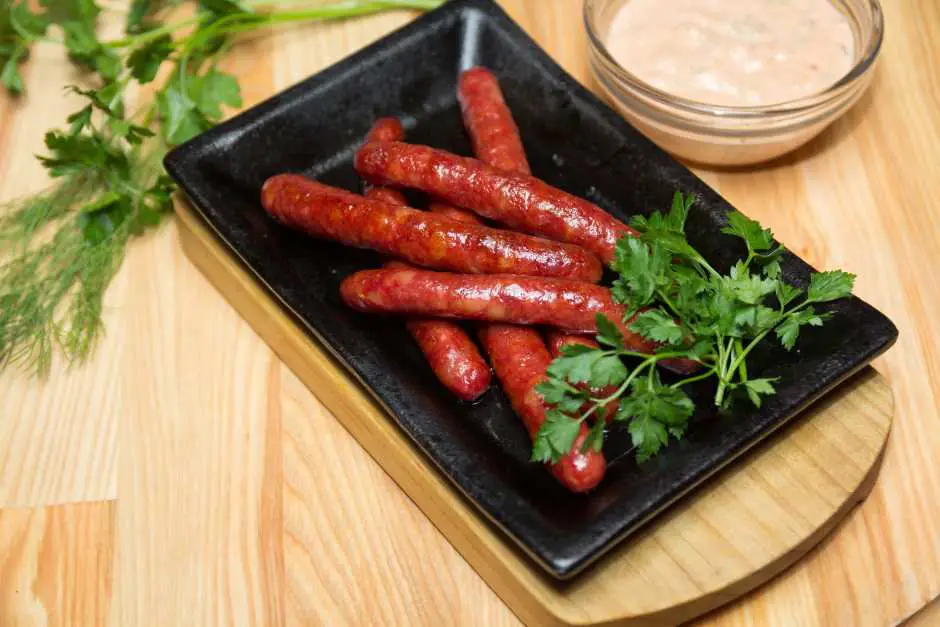Serve sausage with herbs