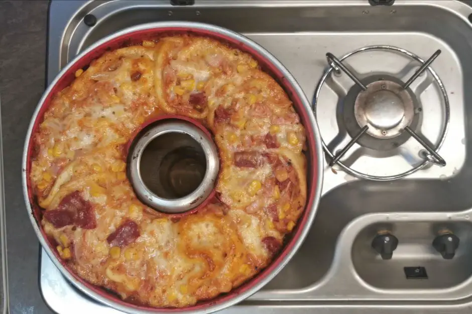 Pizza in the Omnia oven on the gas stove