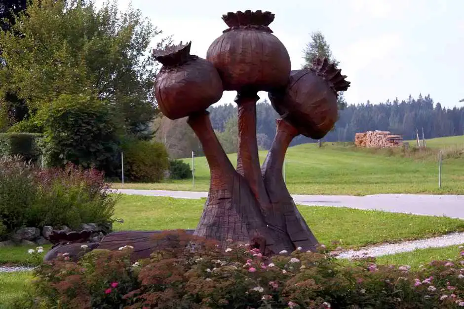 Poppy pods made of wood in the poppy garden of Armschlag, Mohndorf in the Waldviertel