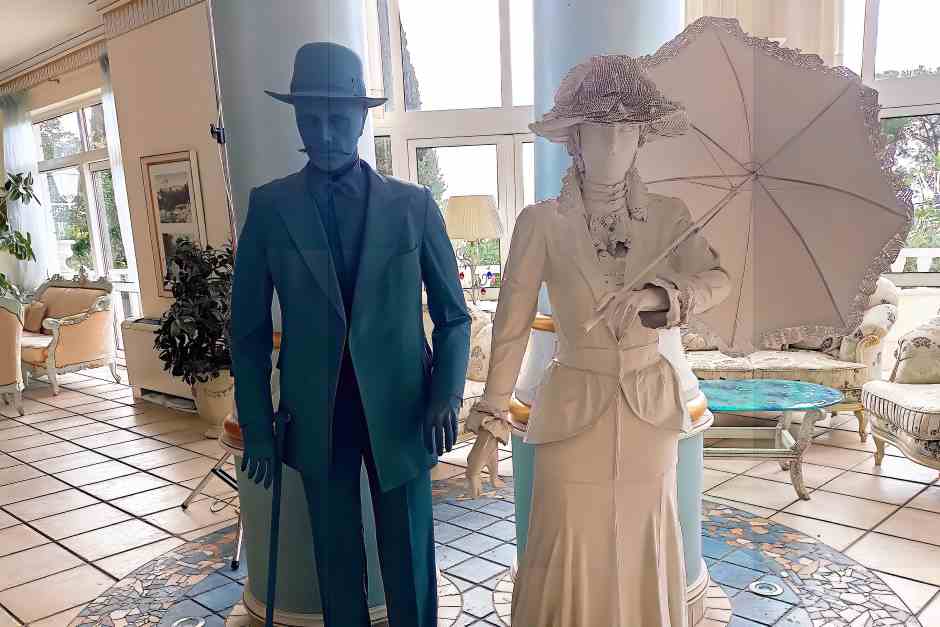 Statues of guests from the imperial era in the hotel lobby of the Hotel Miramar in Opatija Croatia